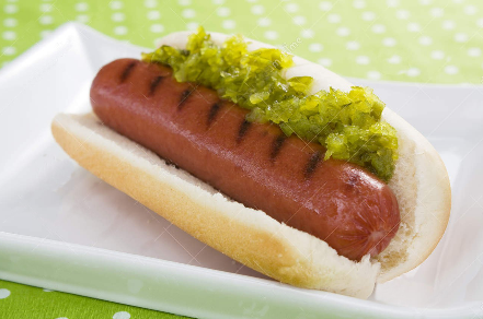 A photo of a hotdog with relish on it